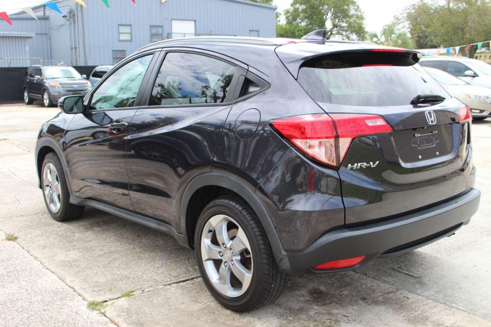 2016 BLACK HONDA HR-V EXL (3CZRU5H7XGM) with an 1.8L engine, Continuously Variable transmission, located at 6921 40th St N, Pinellas Park, FL, 33781, (727) 366-8136, 27.834944, -82.687653 - Photo#2
