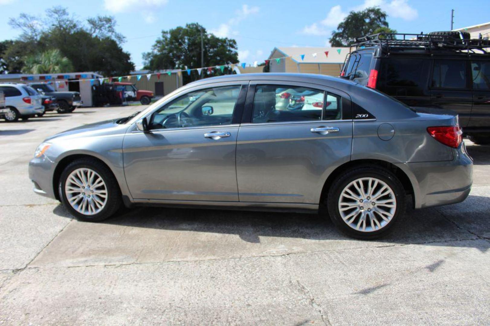 2012 SILVER CHRYSLER 200 LIMITED (1C3CCBCB7CN) with an 2.4L engine, Automatic transmission, located at 6921 40th St N, Pinellas Park, FL, 33781, (727) 366-8136, 27.834944, -82.687653 - Photo#1