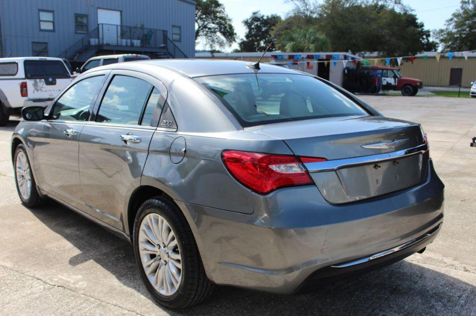 2012 SILVER CHRYSLER 200 LIMITED (1C3CCBCB7CN) with an 2.4L engine, Automatic transmission, located at 6921 40th St N, Pinellas Park, FL, 33781, (727) 366-8136, 27.834944, -82.687653 - Photo#2