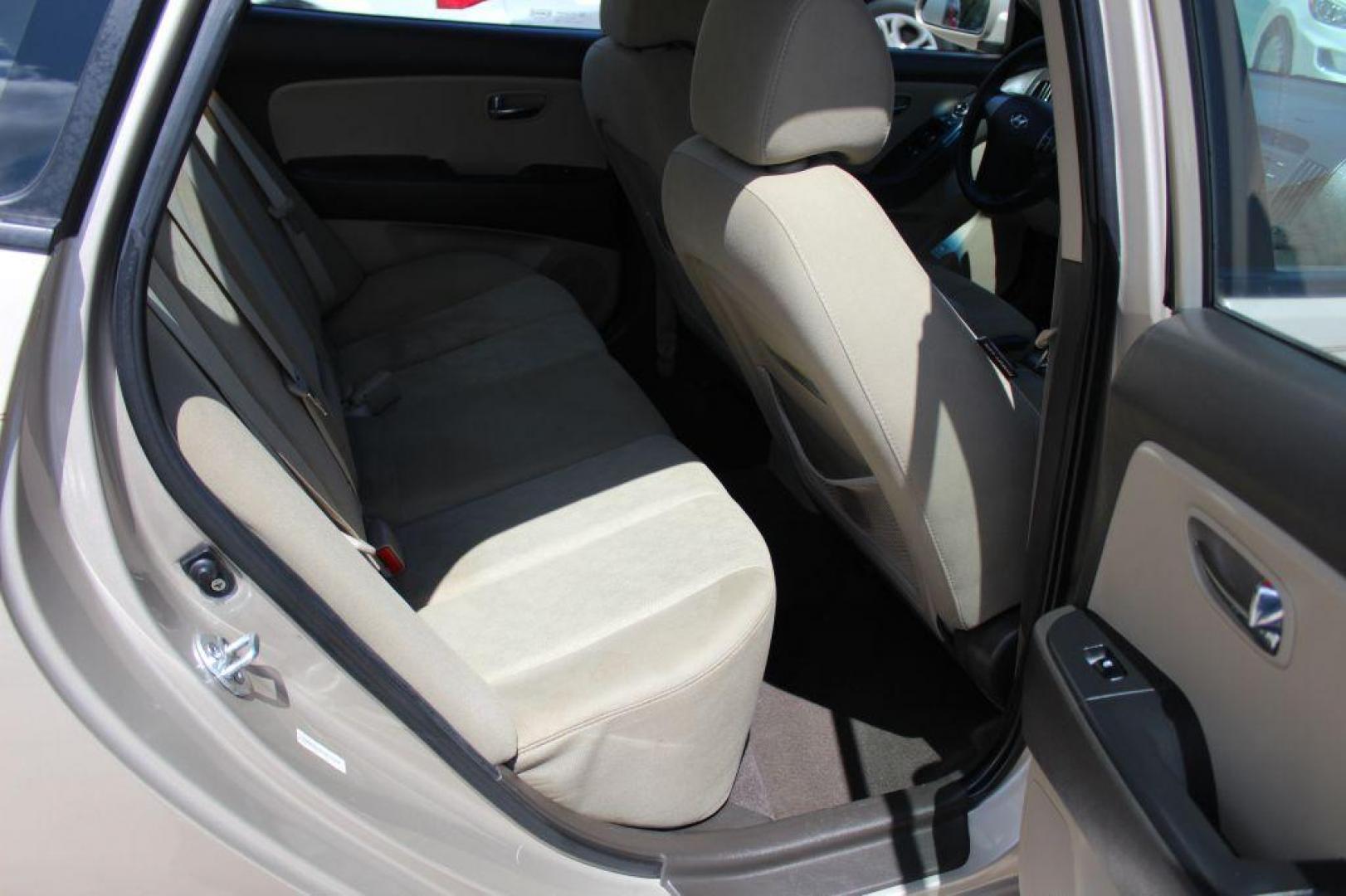 2010 GOLD HYUNDAI ELANTRA GLS (KMHDU4AD8AU) with an 2.0L engine, Automatic transmission, located at 6921 40th St N, Pinellas Park, FL, 33781, (727) 366-8136, 27.834944, -82.687653 - Gorgeous Elantra, Extremely Clean inside and out with Super low miles. Just been Fully Serviced and inspected. Brand New Tires Installed, New Brakes, Fresh Oil and Filter Change. This Vehicle is reliable and will take you anywhere in style and comfort. Would make a Great Student Car, Commuter GAS - Photo#14