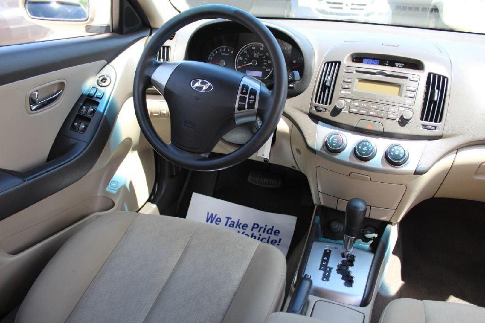 2010 GOLD HYUNDAI ELANTRA GLS (KMHDU4AD8AU) with an 2.0L engine, Automatic transmission, located at 6921 40th St N, Pinellas Park, FL, 33781, (727) 366-8136, 27.834944, -82.687653 - Gorgeous Elantra, Extremely Clean inside and out with Super low miles. Just been Fully Serviced and inspected. Brand New Tires Installed, New Brakes, Fresh Oil and Filter Change. This Vehicle is reliable and will take you anywhere in style and comfort. Would make a Great Student Car, Commuter GAS - Photo#16