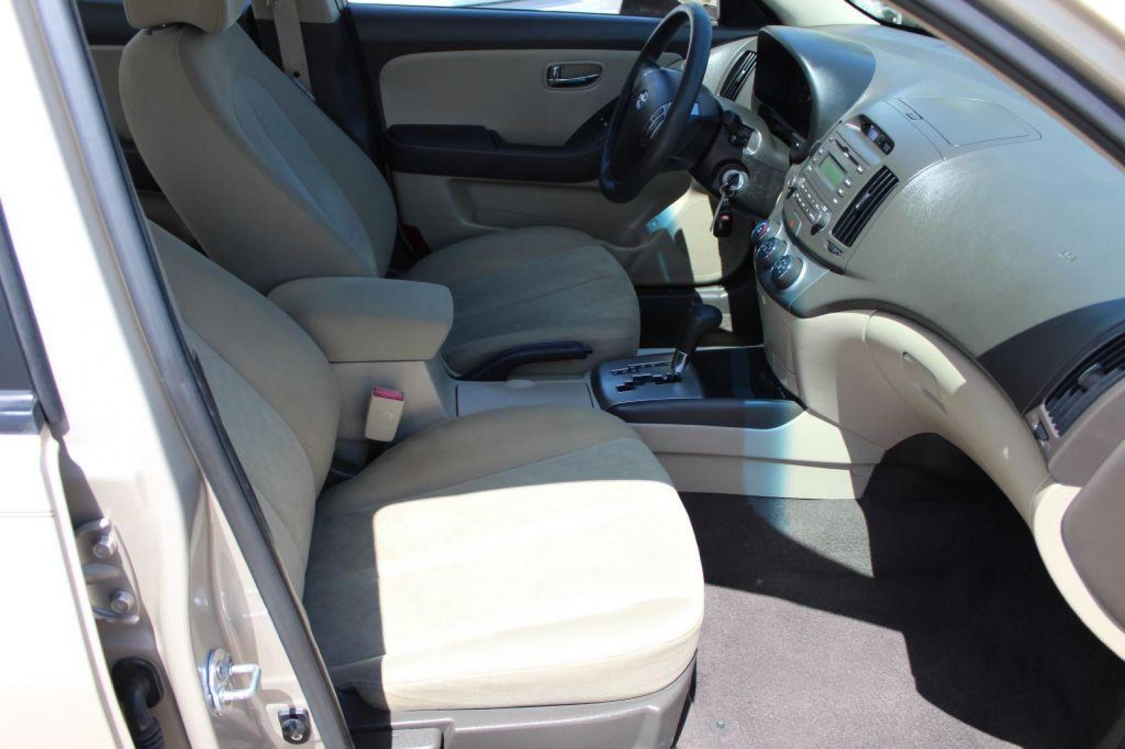 2010 GOLD HYUNDAI ELANTRA GLS (KMHDU4AD8AU) with an 2.0L engine, Automatic transmission, located at 6921 40th St N, Pinellas Park, FL, 33781, (727) 366-8136, 27.834944, -82.687653 - Gorgeous Elantra, Extremely Clean inside and out with Super low miles. Just been Fully Serviced and inspected. Brand New Tires Installed, New Brakes, Fresh Oil and Filter Change. This Vehicle is reliable and will take you anywhere in style and comfort. Would make a Great Student Car, Commuter GAS - Photo#19