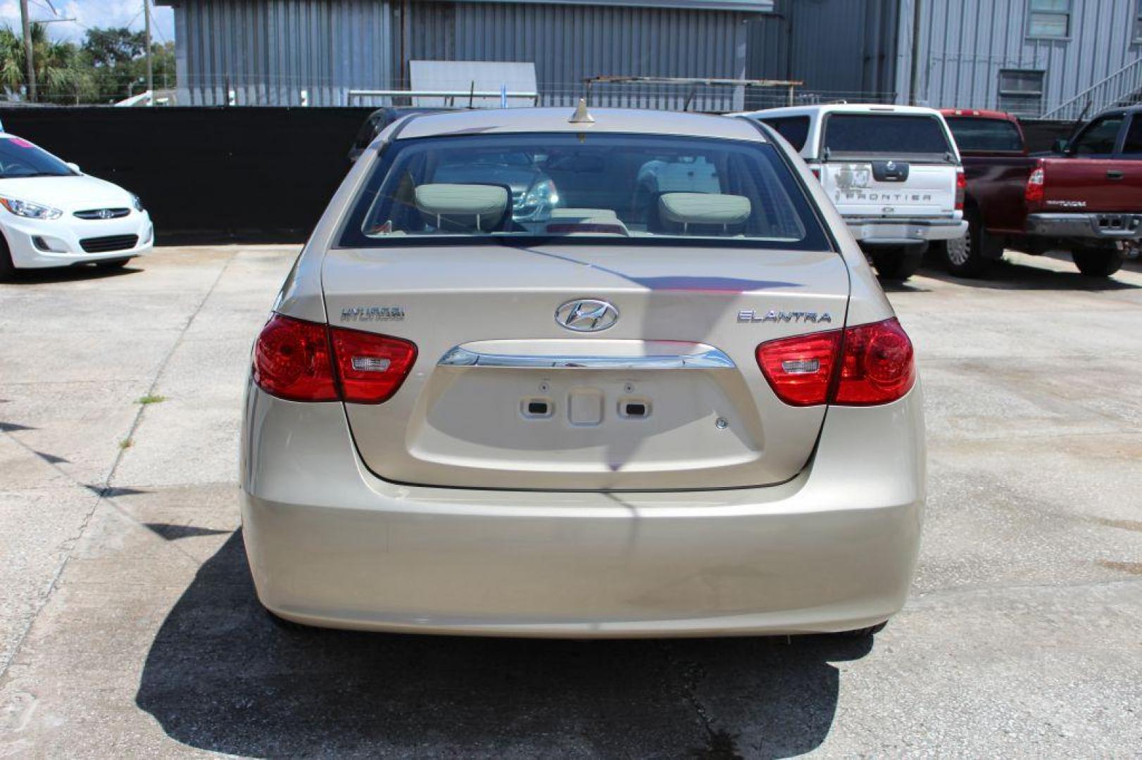2010 GOLD HYUNDAI ELANTRA GLS (KMHDU4AD8AU) with an 2.0L engine, Automatic transmission, located at 6921 40th St N, Pinellas Park, FL, 33781, (727) 366-8136, 27.834944, -82.687653 - Gorgeous Elantra, Extremely Clean inside and out with Super low miles. Just been Fully Serviced and inspected. Brand New Tires Installed, New Brakes, Fresh Oil and Filter Change. This Vehicle is reliable and will take you anywhere in style and comfort. Would make a Great Student Car, Commuter GAS - Photo#3