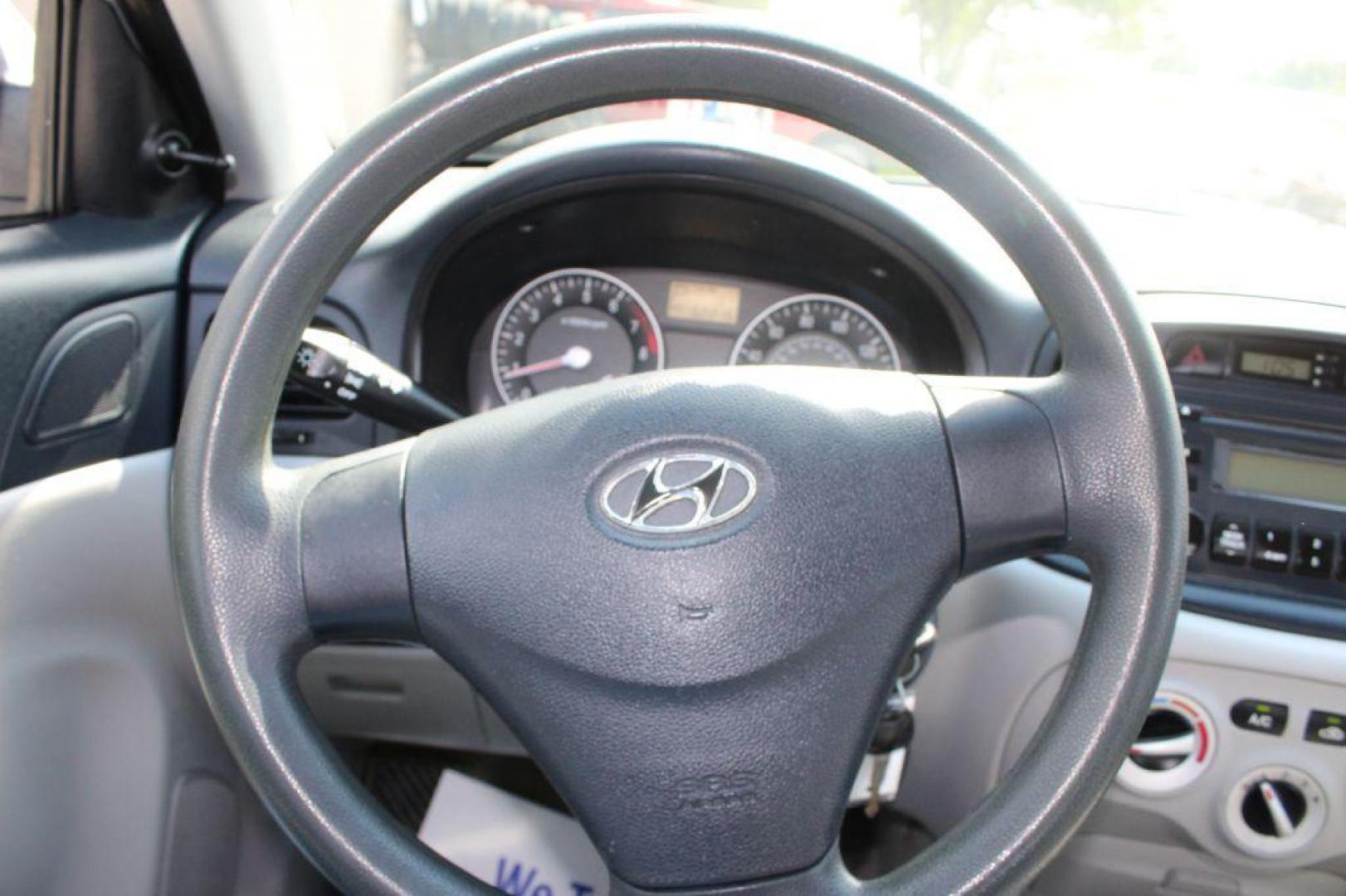 2007 SILVER HYUNDAI ACCENT GLS (KMHCN46C57U) with an 1.6L engine, Automatic transmission, located at 6921 40th St N, Pinellas Park, FL, 33781, (727) 366-8136, 27.834944, -82.687653 - Photo#26