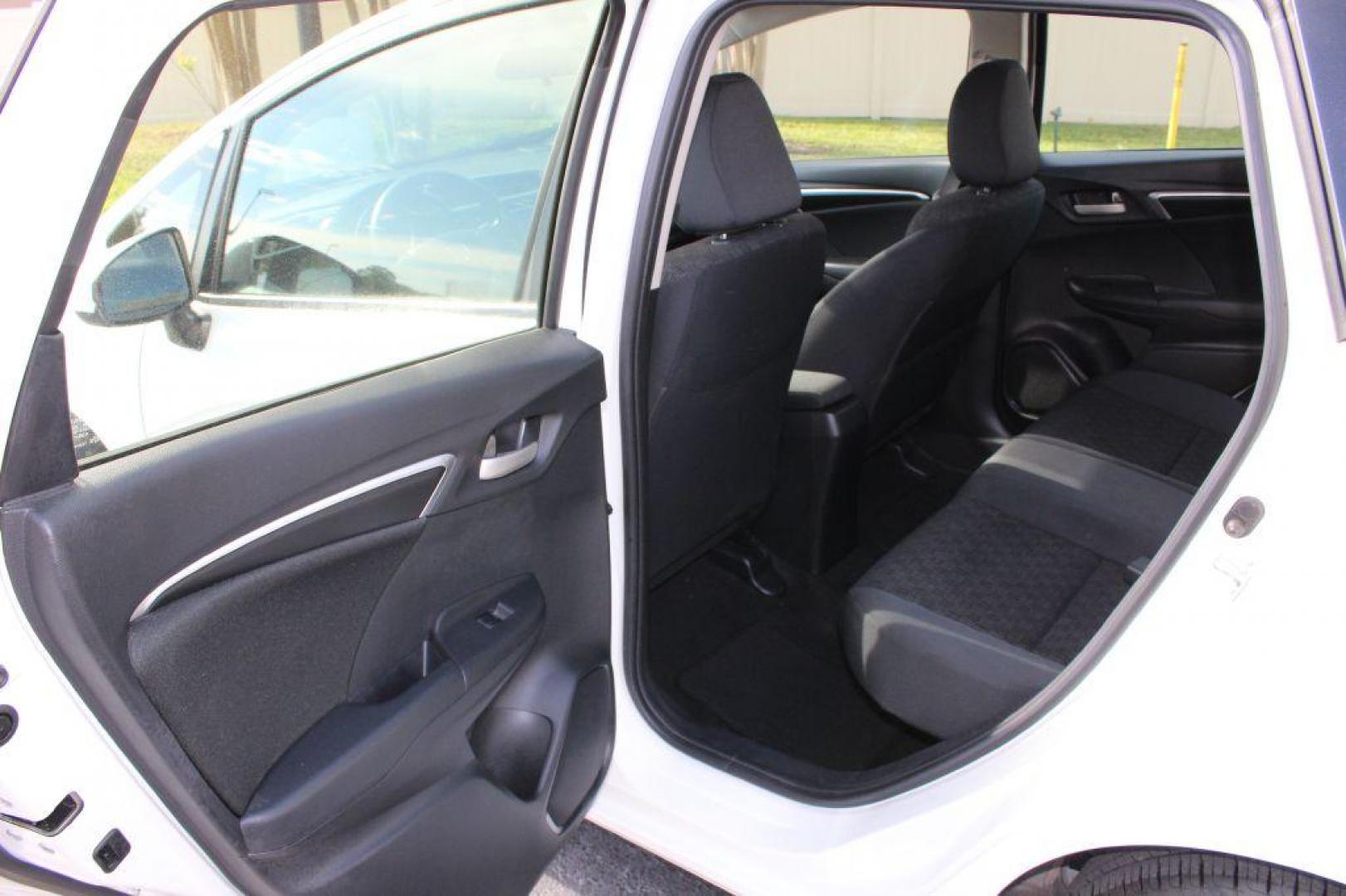 2017 WHITE HONDA FIT LX (JHMGK5H5XHS) with an 1.5L engine, Continuously Variable transmission, located at 6921 40th St N, Pinellas Park, FL, 33781, (727) 366-8136, 27.834944, -82.687653 - Photo#11