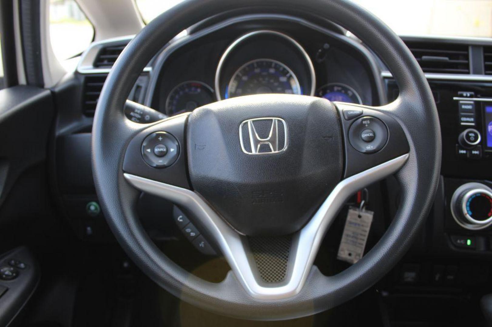 2017 WHITE HONDA FIT LX (JHMGK5H5XHS) with an 1.5L engine, Continuously Variable transmission, located at 6921 40th St N, Pinellas Park, FL, 33781, (727) 366-8136, 27.834944, -82.687653 - Photo#27
