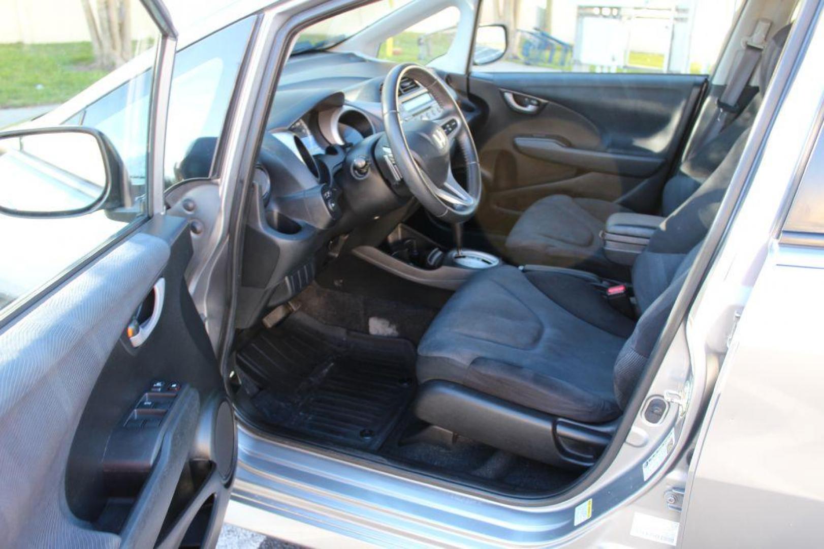 2009 SILVER HONDA FIT SPORT (JHMGE88479S) with an 1.5L engine, Automatic transmission, located at 6921 40th St N, Pinellas Park, FL, 33781, (727) 366-8136, 27.834944, -82.687653 - 1-Owner 2009 Honda Fit Sport with Low Miles, Bluetooth, AUX inputs and More. Fully Serviced and Ready to Go! Great First Vehicle, Small Commute Jobs or even Food Delivery Services. Clean CarFax History Report and A Florida Vehicle it's Whole Life. Very Well Maintained and great Service history Avai - Photo#8