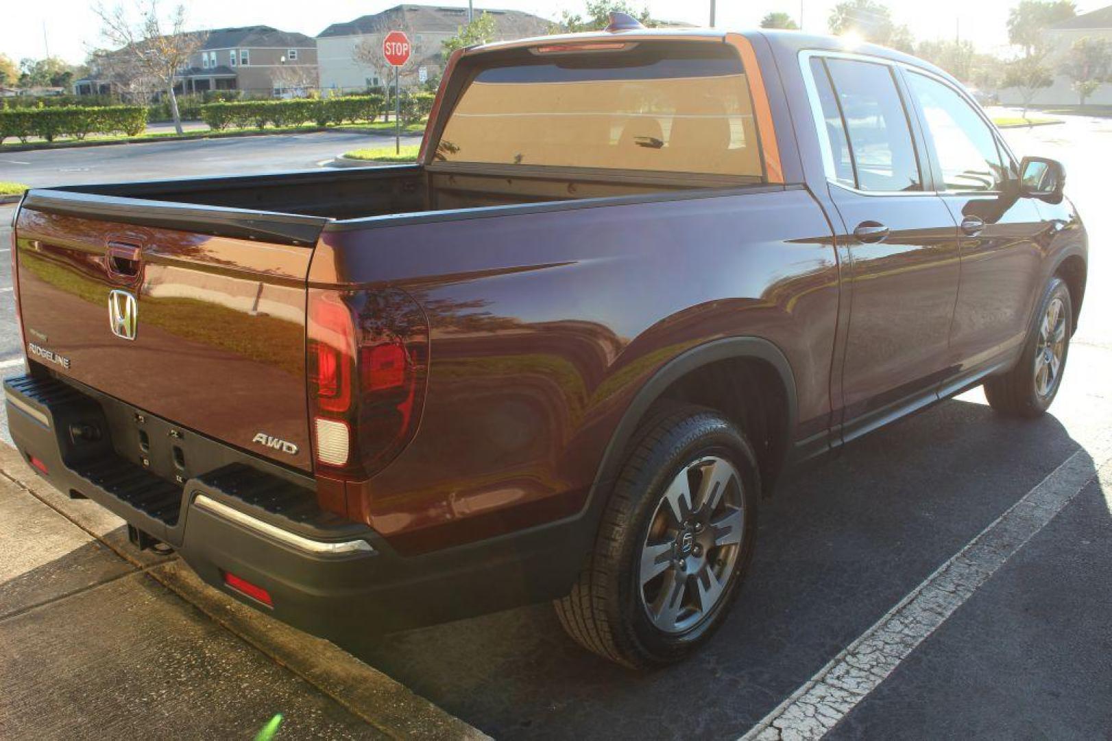 2017 MAROON HONDA RIDGELINE RTL (5FPYK3F63HB) with an 3.5L engine, Automatic transmission, located at 6921 40th St N, Pinellas Park, FL, 33781, (727) 366-8136, 27.834944, -82.687653 - Photo#9
