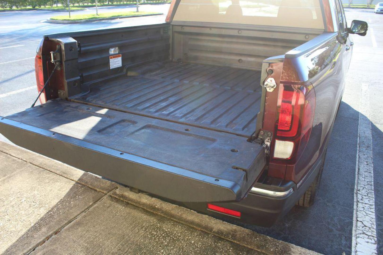 2017 MAROON HONDA RIDGELINE RTL (5FPYK3F63HB) with an 3.5L engine, Automatic transmission, located at 6921 40th St N, Pinellas Park, FL, 33781, (727) 366-8136, 27.834944, -82.687653 - Photo#19