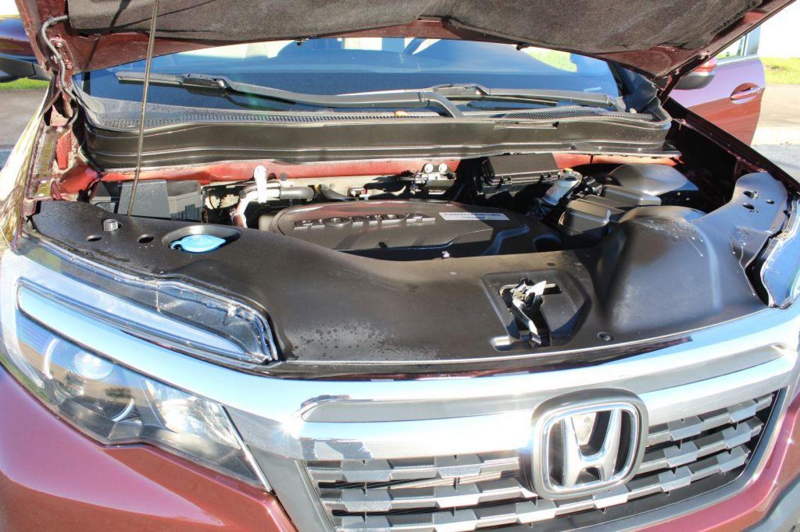 2017 MAROON HONDA RIDGELINE RTL (5FPYK3F63HB) with an 3.5L engine, Automatic transmission, located at 6921 40th St N, Pinellas Park, FL, 33781, (727) 366-8136, 27.834944, -82.687653 - Photo#28