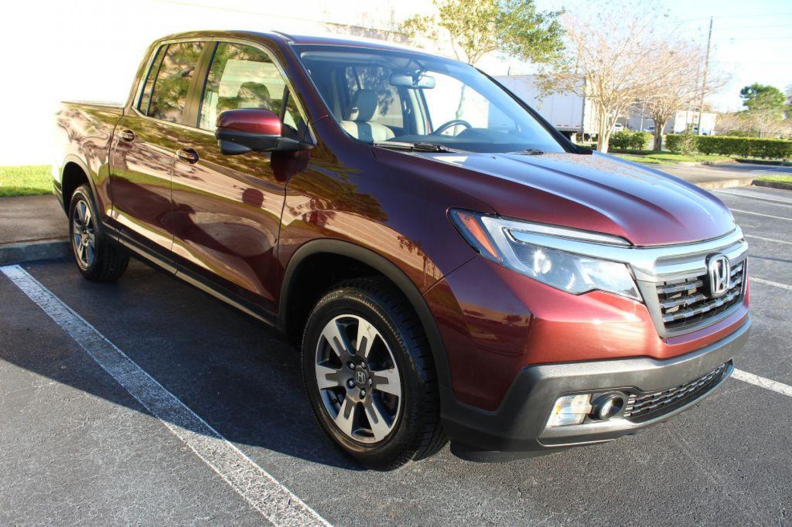 2017 MAROON HONDA RIDGELINE RTL (5FPYK3F63HB) with an 3.5L engine, Automatic transmission, located at 6921 40th St N, Pinellas Park, FL, 33781, (727) 366-8136, 27.834944, -82.687653 - Photo#4