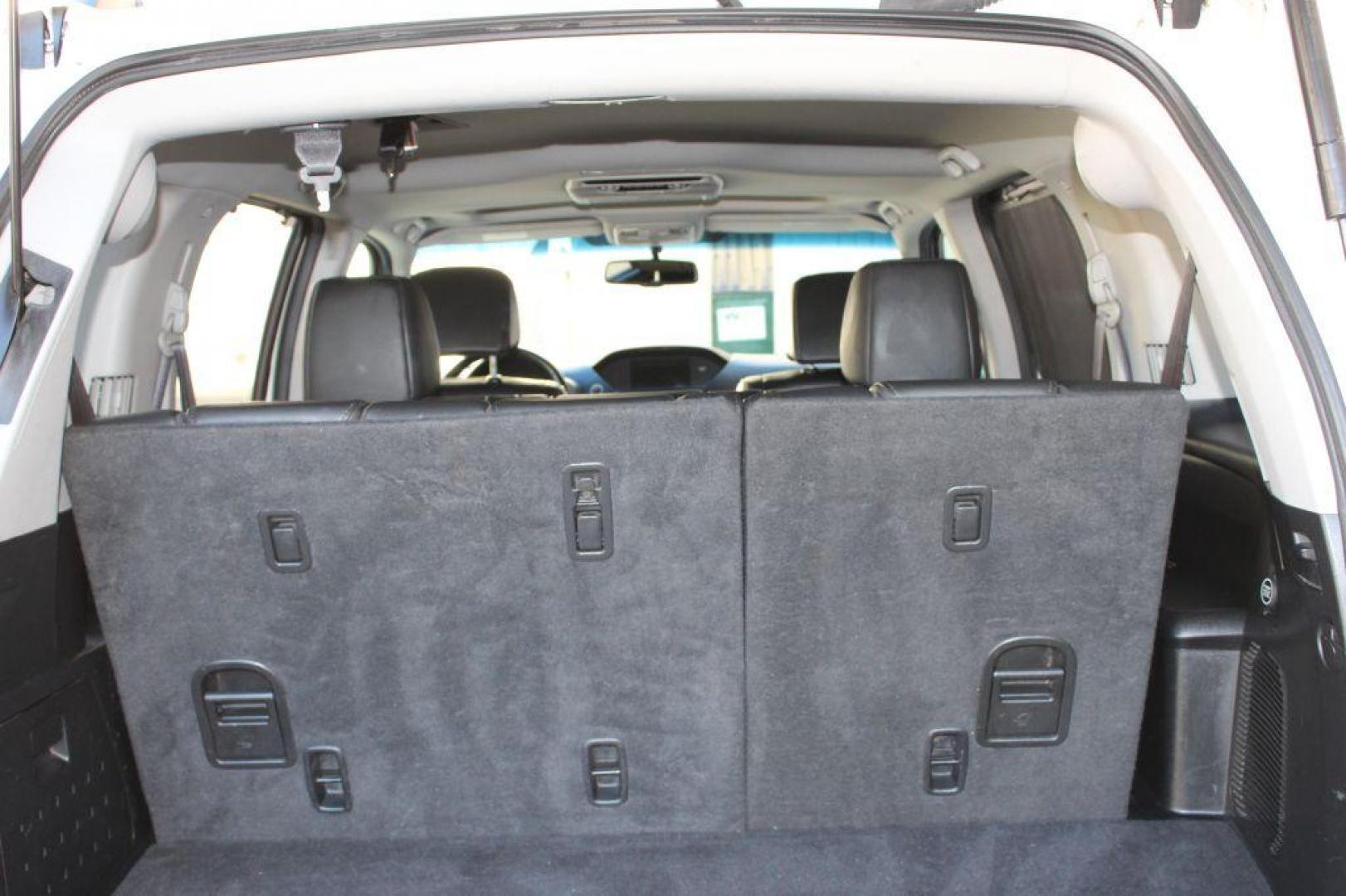 2012 WHITE HONDA PILOT TOURING (5FNYF4H97CB) with an 3.5L engine, Automatic transmission, located at 6921 40th St N, Pinellas Park, FL, 33781, (727) 366-8136, 27.834944, -82.687653 - ONE OWNER 2012 HONDA PILOT - Full Clean Carfax Report - Loaded with 3rd Row Seating, Black Leather Interior, All Wheel Drive, Built in Sun Shades on Back Windows, DVD Player with Headphones included, Navigation, Back Up Camera, Bluetooth and Aux input options, and MUCH MORE! Must See! *****100% T - Photo#25