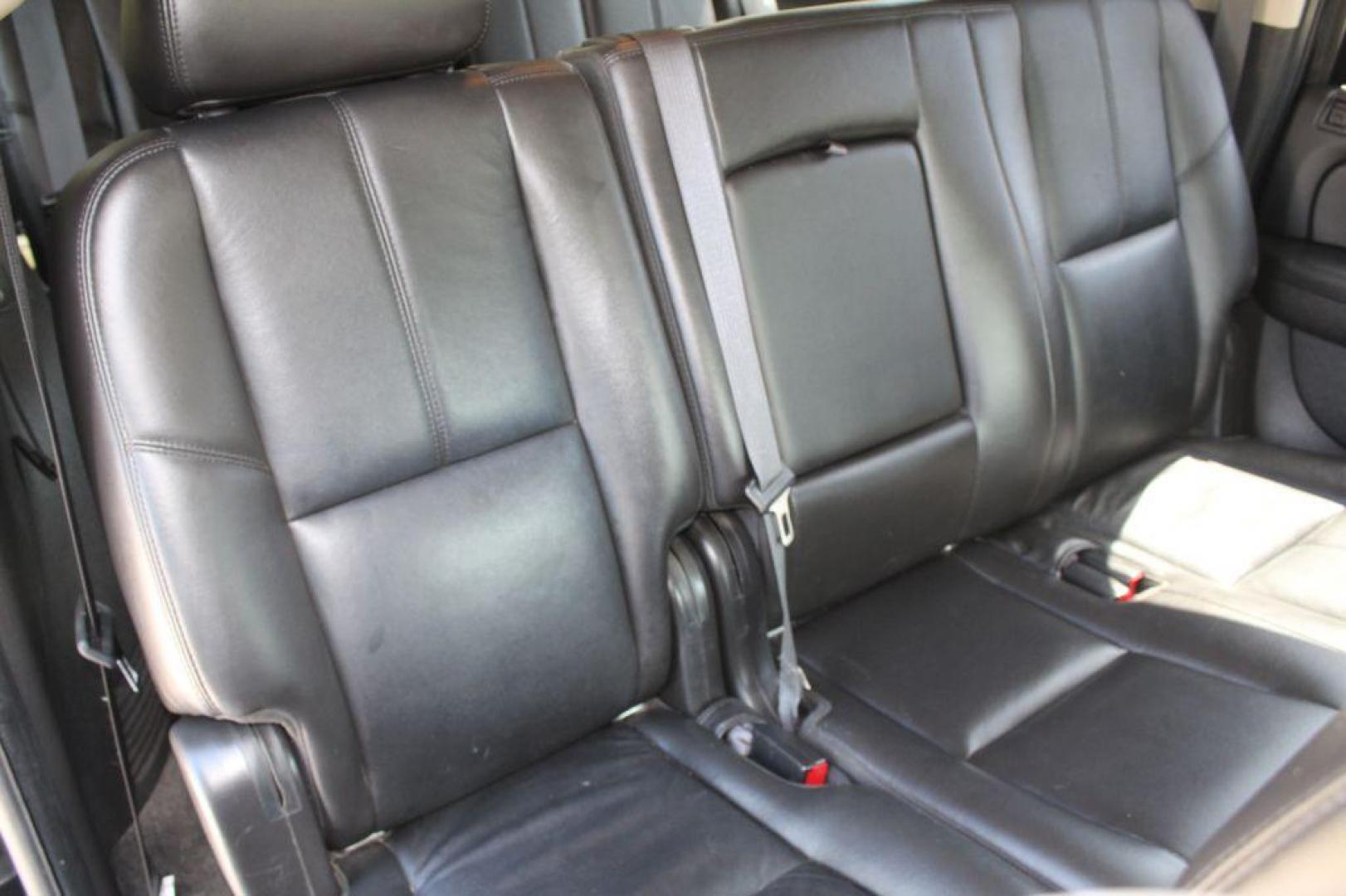 2009 BLACK CHEVROLET SUBURBAN 1500 LT (1GNFK26349R) with an 5.3L engine, Automatic transmission, located at 6921 40th St N, Pinellas Park, FL, 33781, (727) 366-8136, 27.834944, -82.687653 - Photo#24